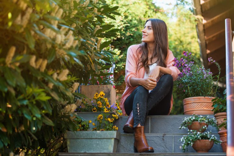 Woman in garden debating her epilepsy diagnosis